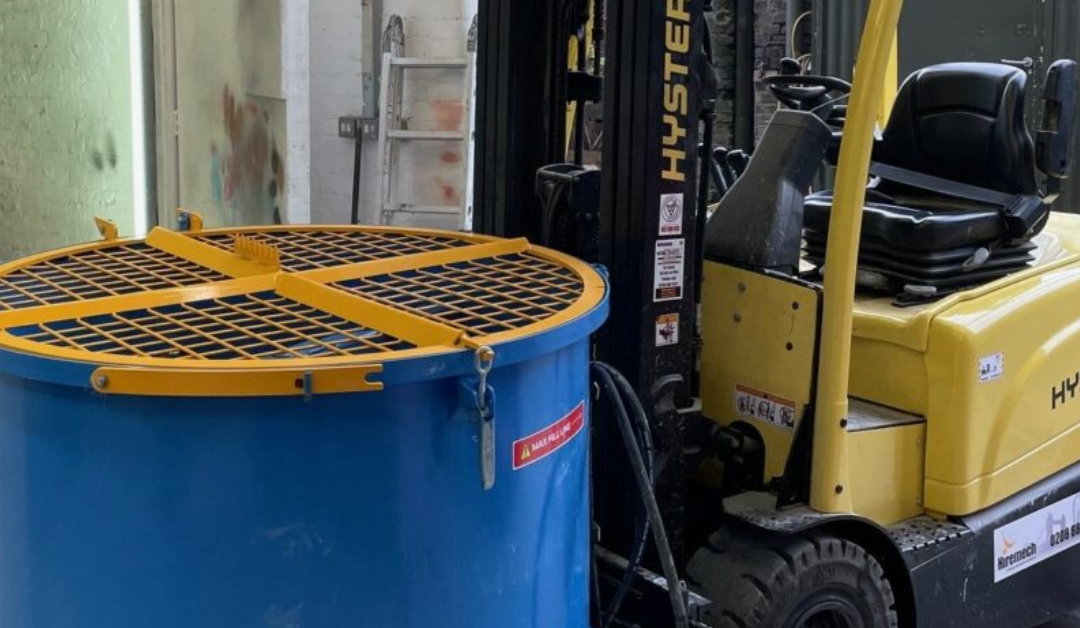 Hyster forklift with a fork-mounted cement mixer